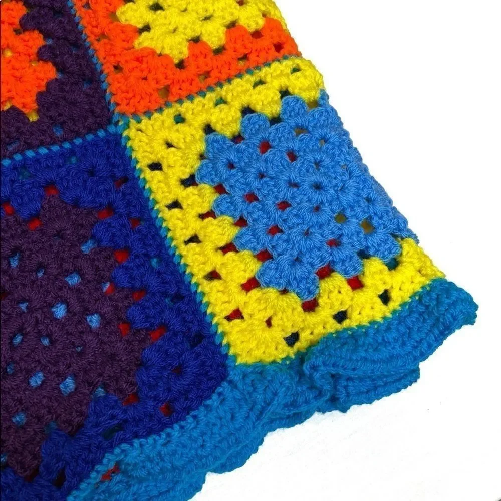 Hand crocheted bright multi colored Afghan size 56” X 31”